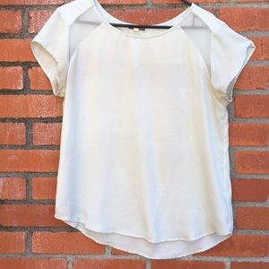 Light blue top with mesh cutouts